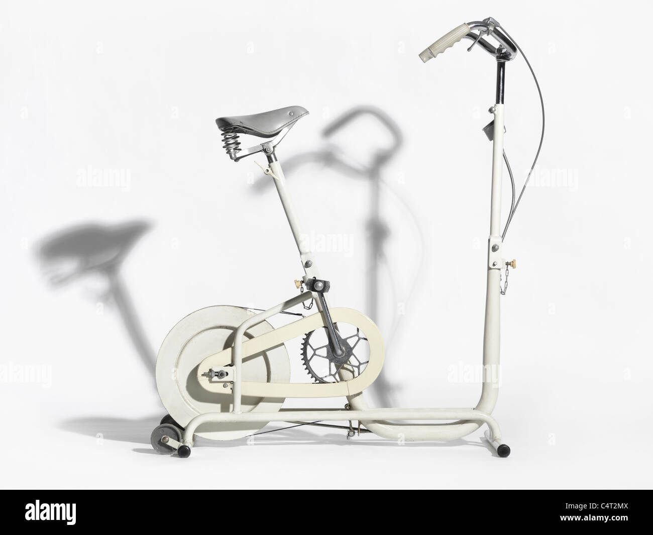 Retro exercise bike isolated on white background Stock Photo