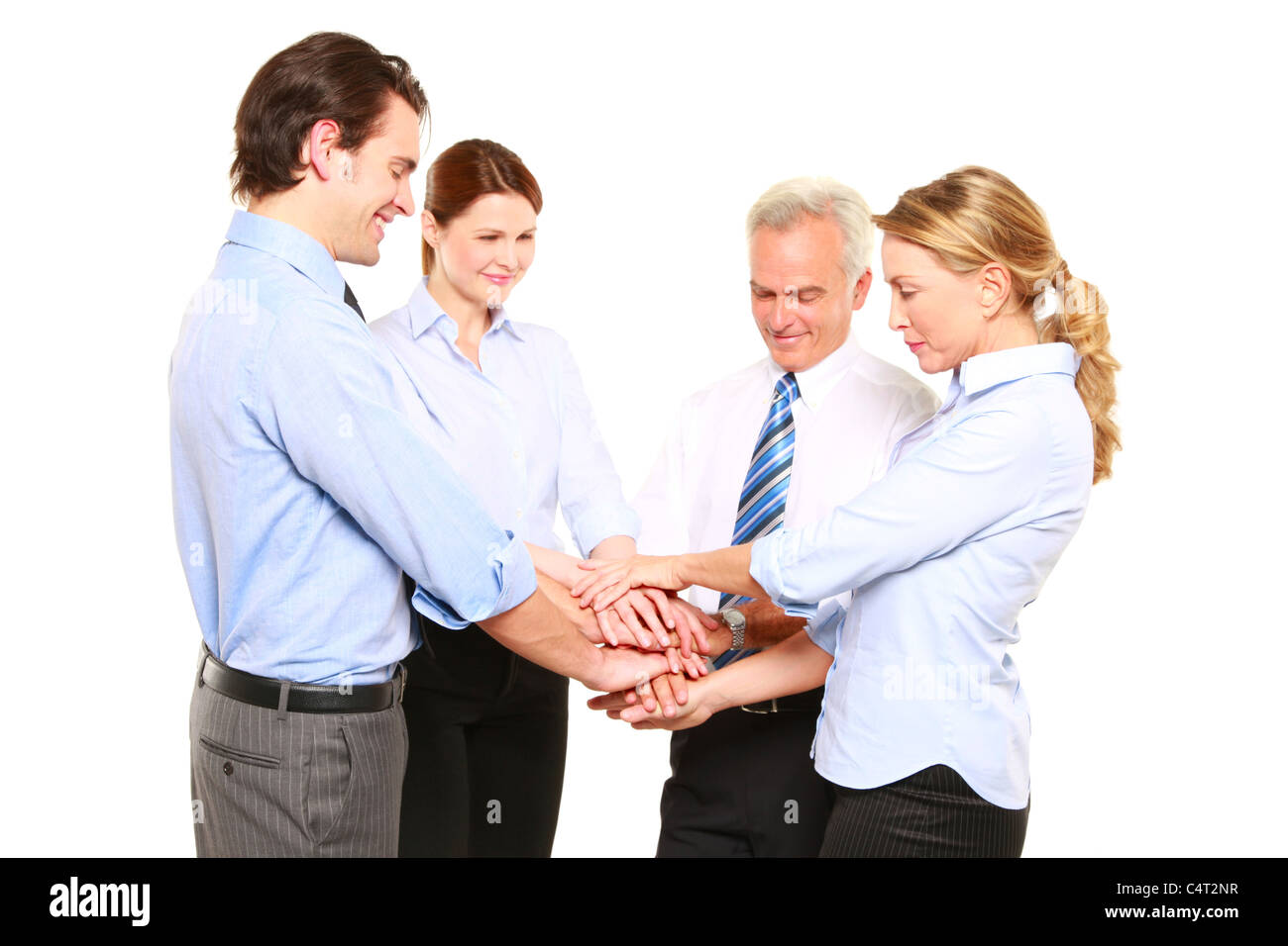 businessmen and businesswomen with hands joined Stock Photo