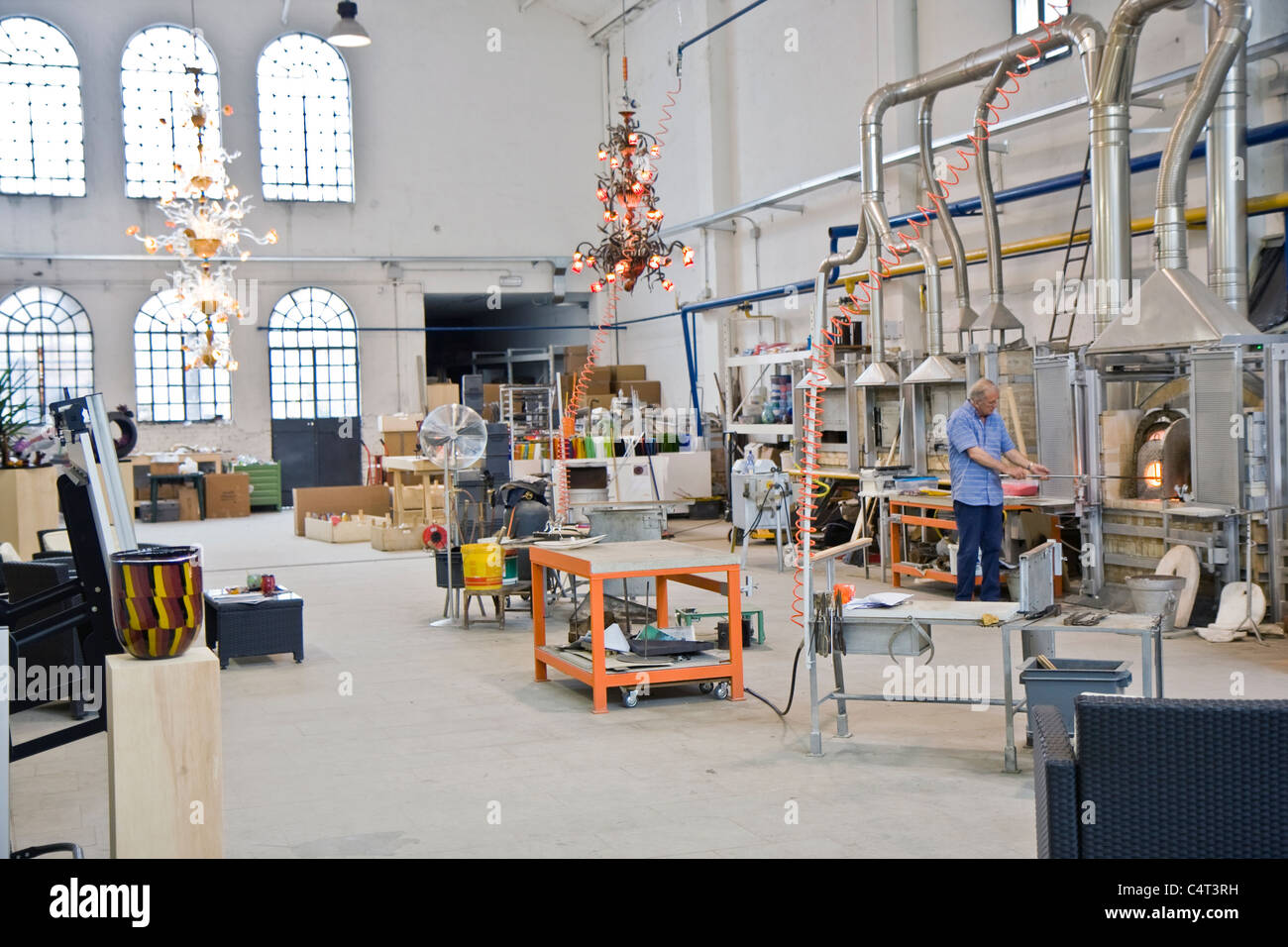 Glass studio at the Murano island next to Venice in Italy. The process of making Murano glass is rather complex. Stock Photo