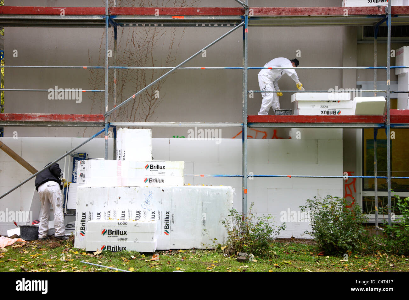 Heat insulation of a building. For saving energy, Styrofoam panels are sticked to the outside