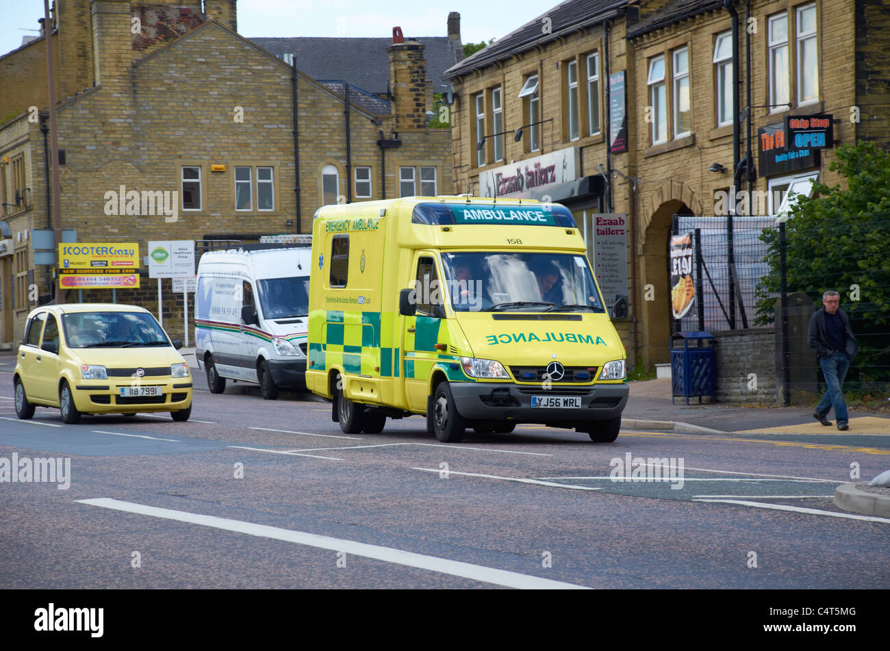 Ambulance attending an emergency in Huddersfield, West Yorkshire. Stock Photo