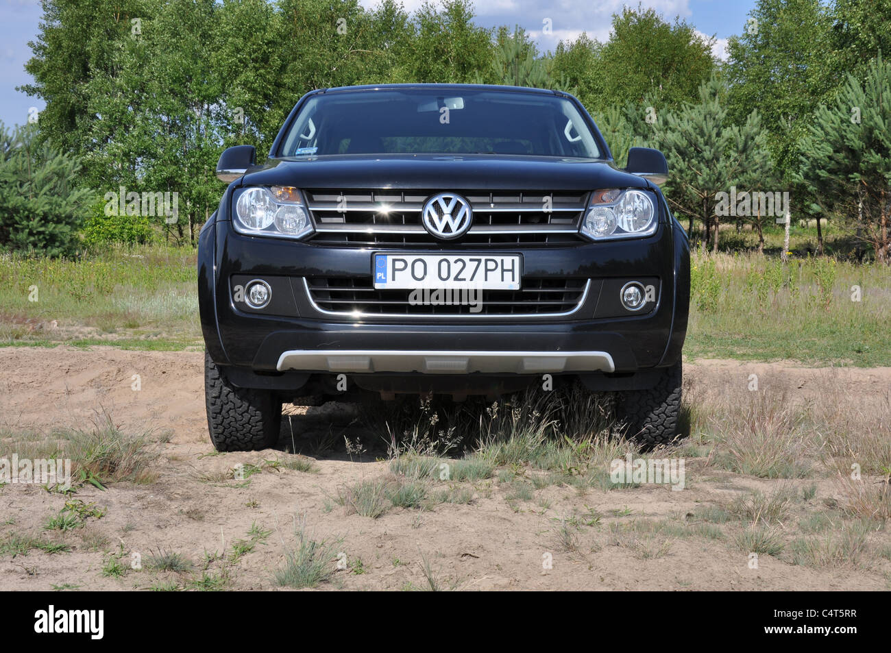 Volkswagen Amarok 2.0 BiTDI 4Motion - MY 2011 - Double Cab - German pick-up - forest, meadow Stock Photo