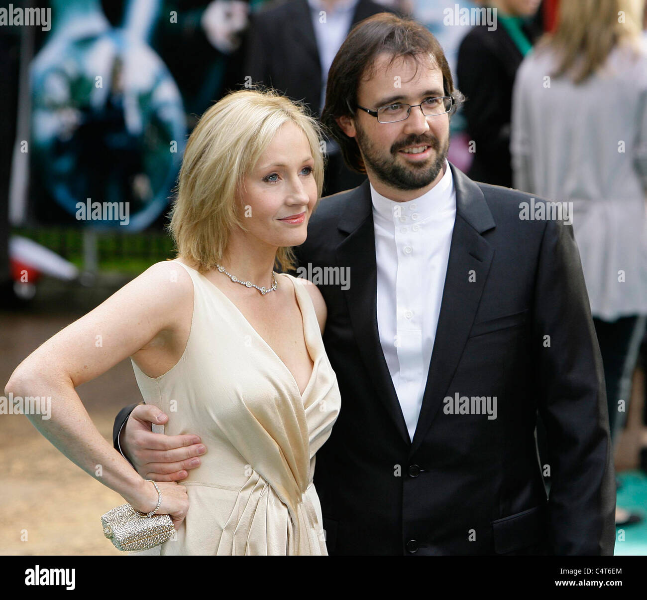 English author JK Rowling and her husband Dr Neil Murray arrive at the premier of 'Harry Potter and the Order of the Phoenix' Stock Photo
