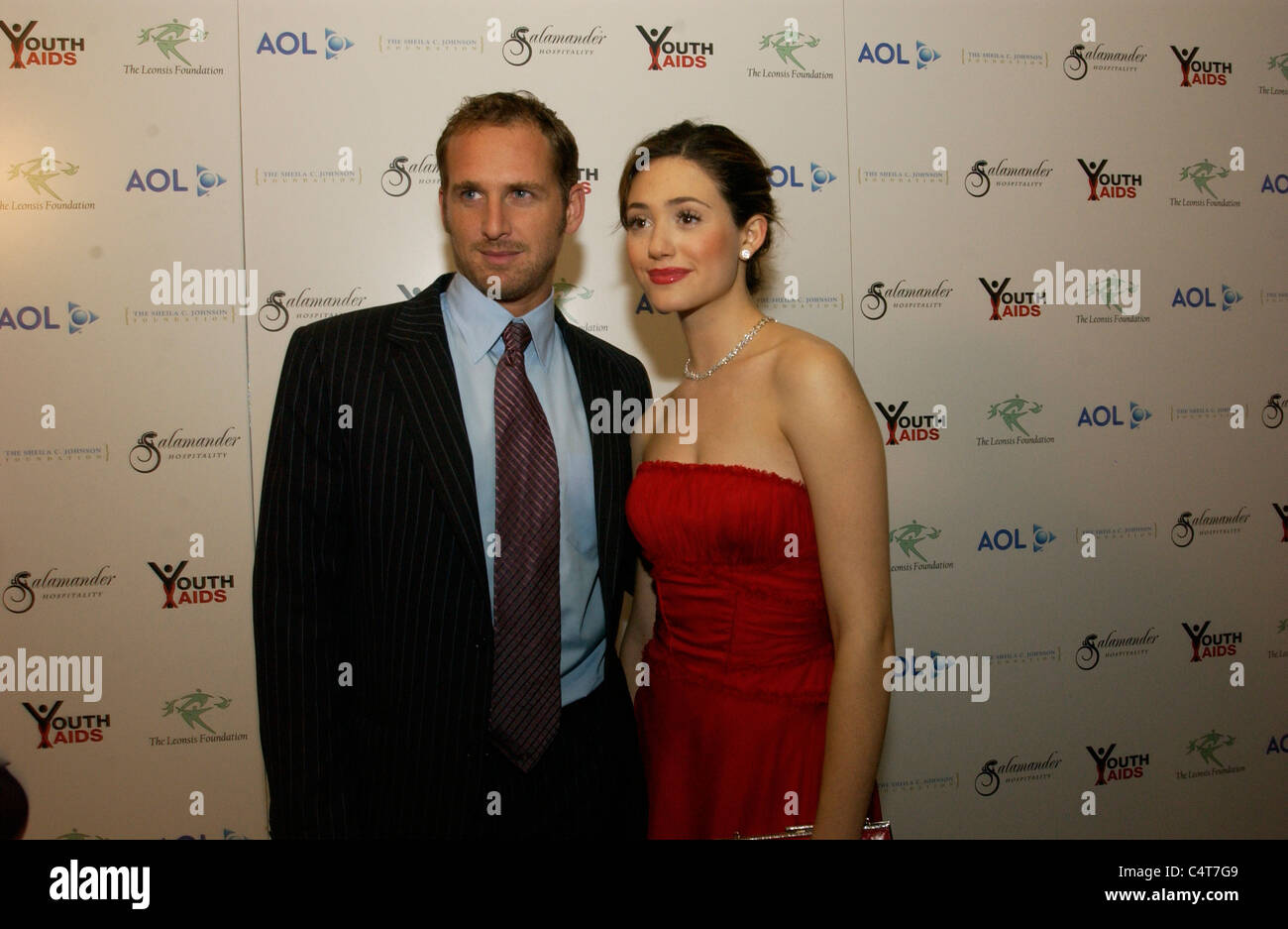 Josh Lucas and Emmy Rossum stand for photos Youth Aids Gala on October 13, 2006 in McLean, VA. YouthAIDS will host its annual ga Stock Photo