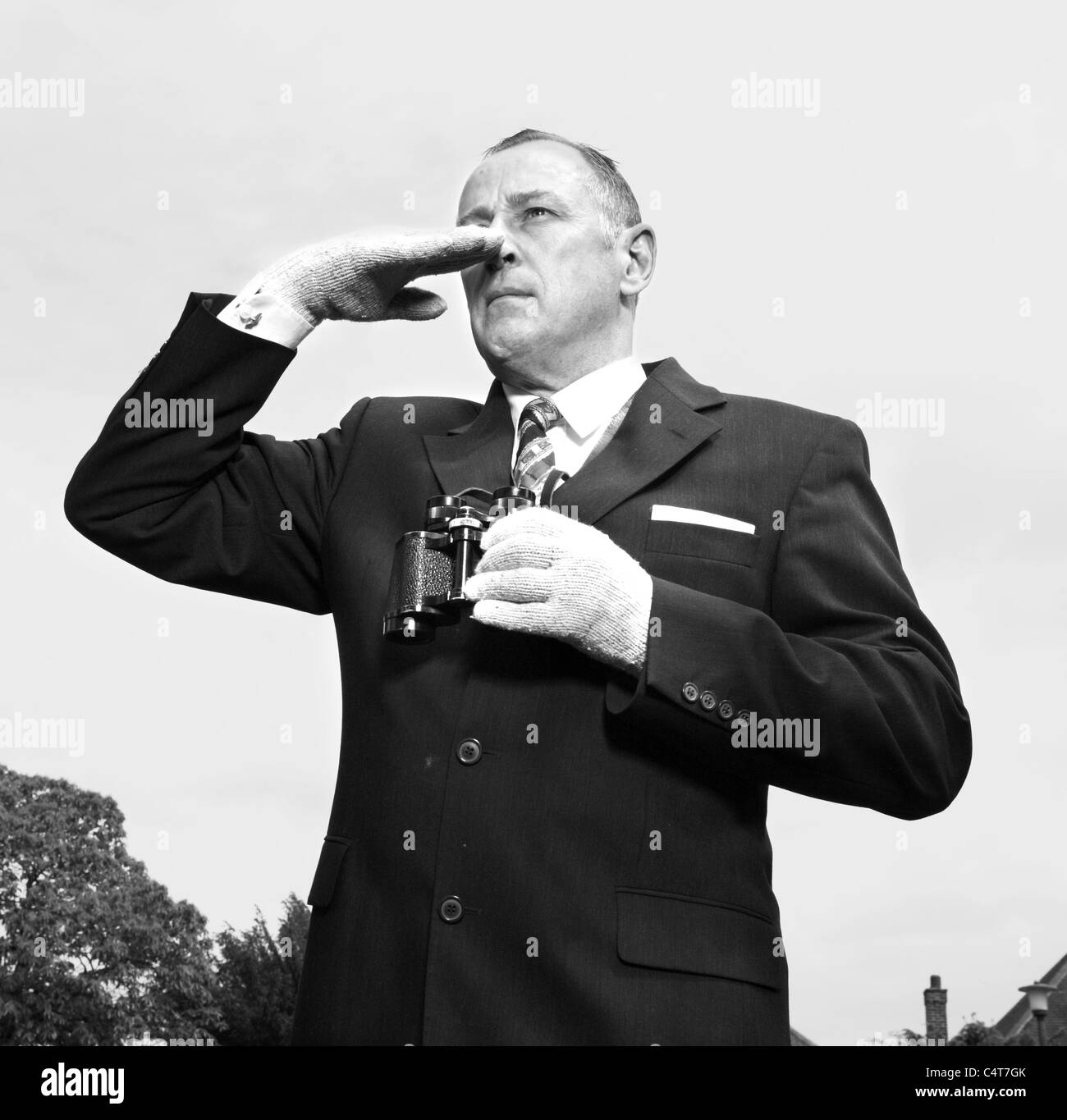 Old fashioned tic bookmaker or  tac man sending a message at the horse races. Stock Photo