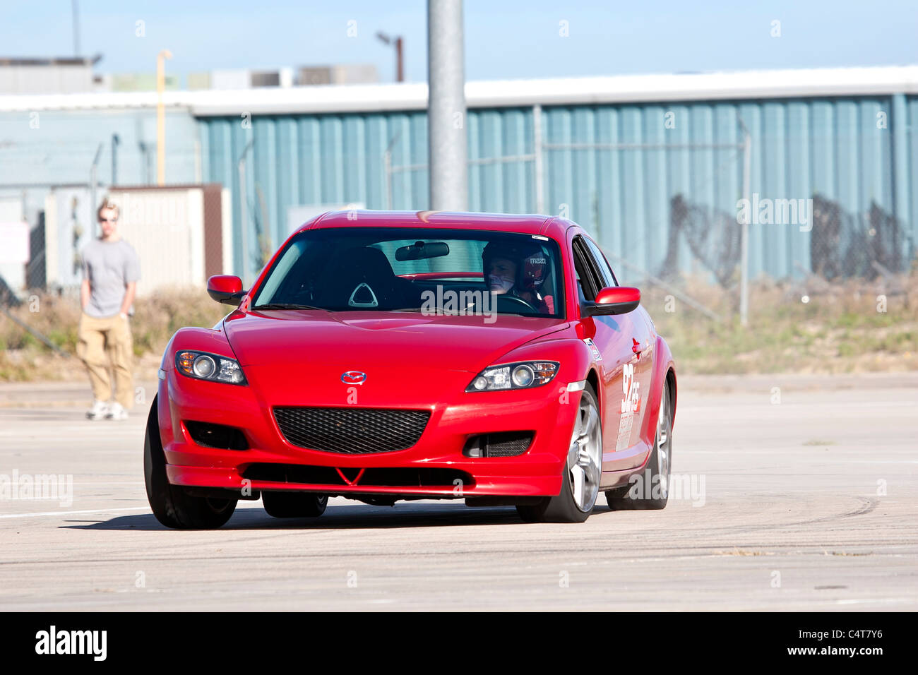 Denver, Colorado -  A 2004 Red Mazda RX-8 in an autocross race at a regional Sports Car Club of America (SCCA) event. Stock Photo
