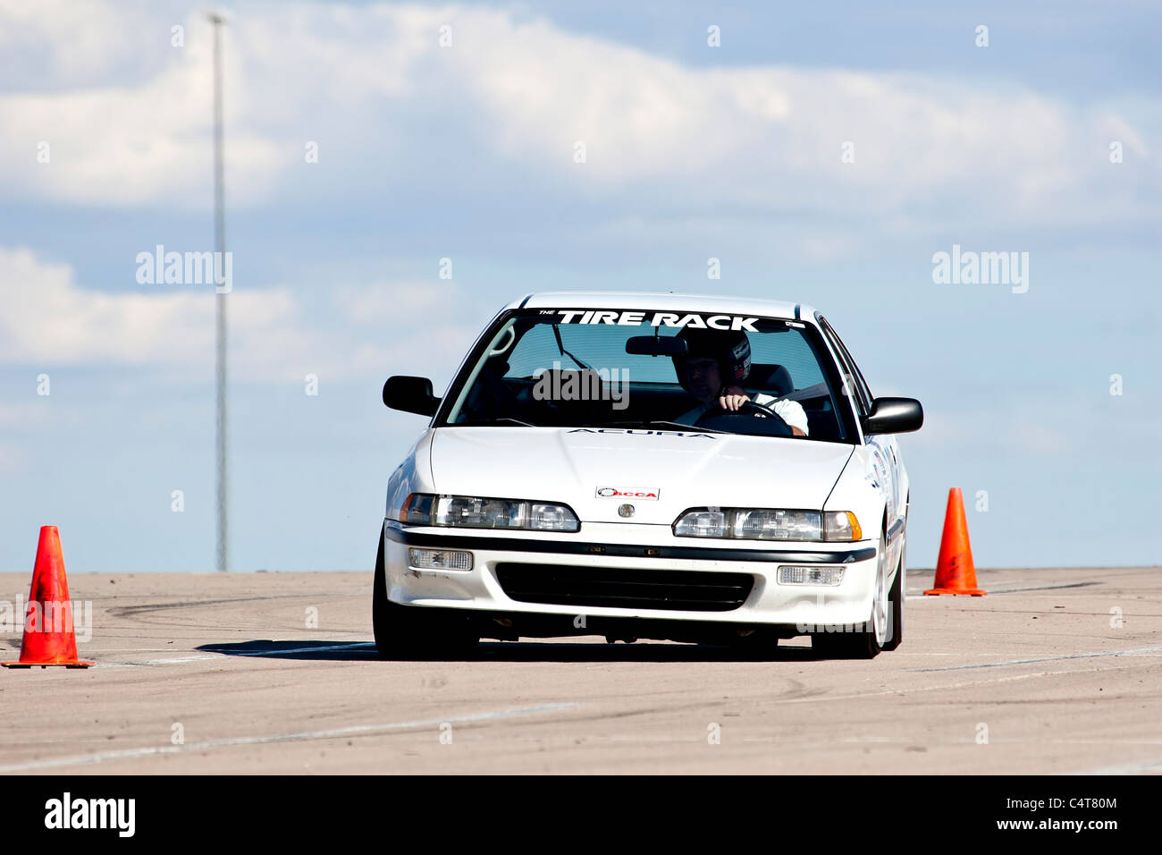 Denver, Colorado A white sports car in an autocross race at a