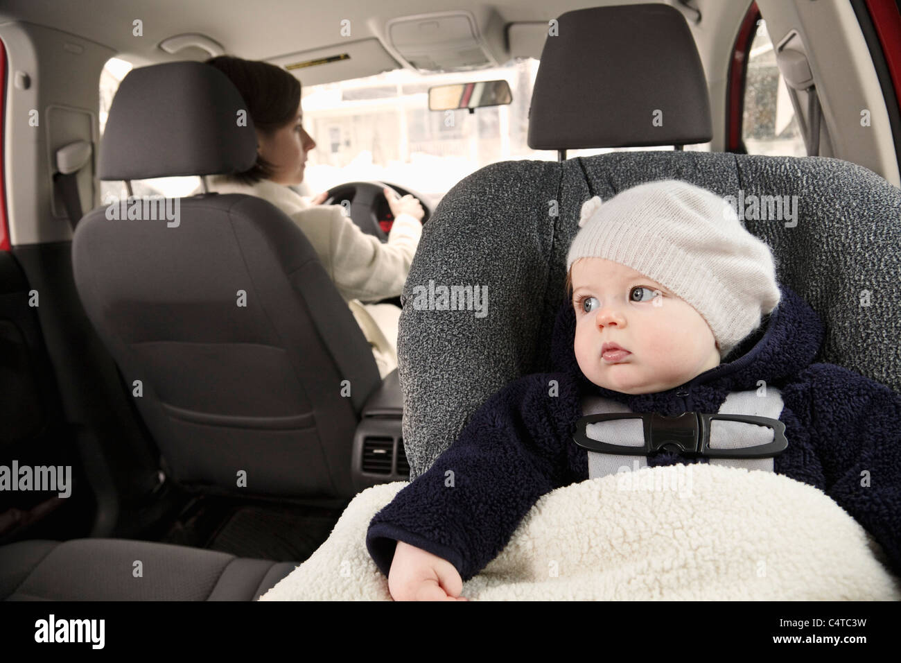 Baby in Car Seat with Mother Driving Stock Photo Alamy