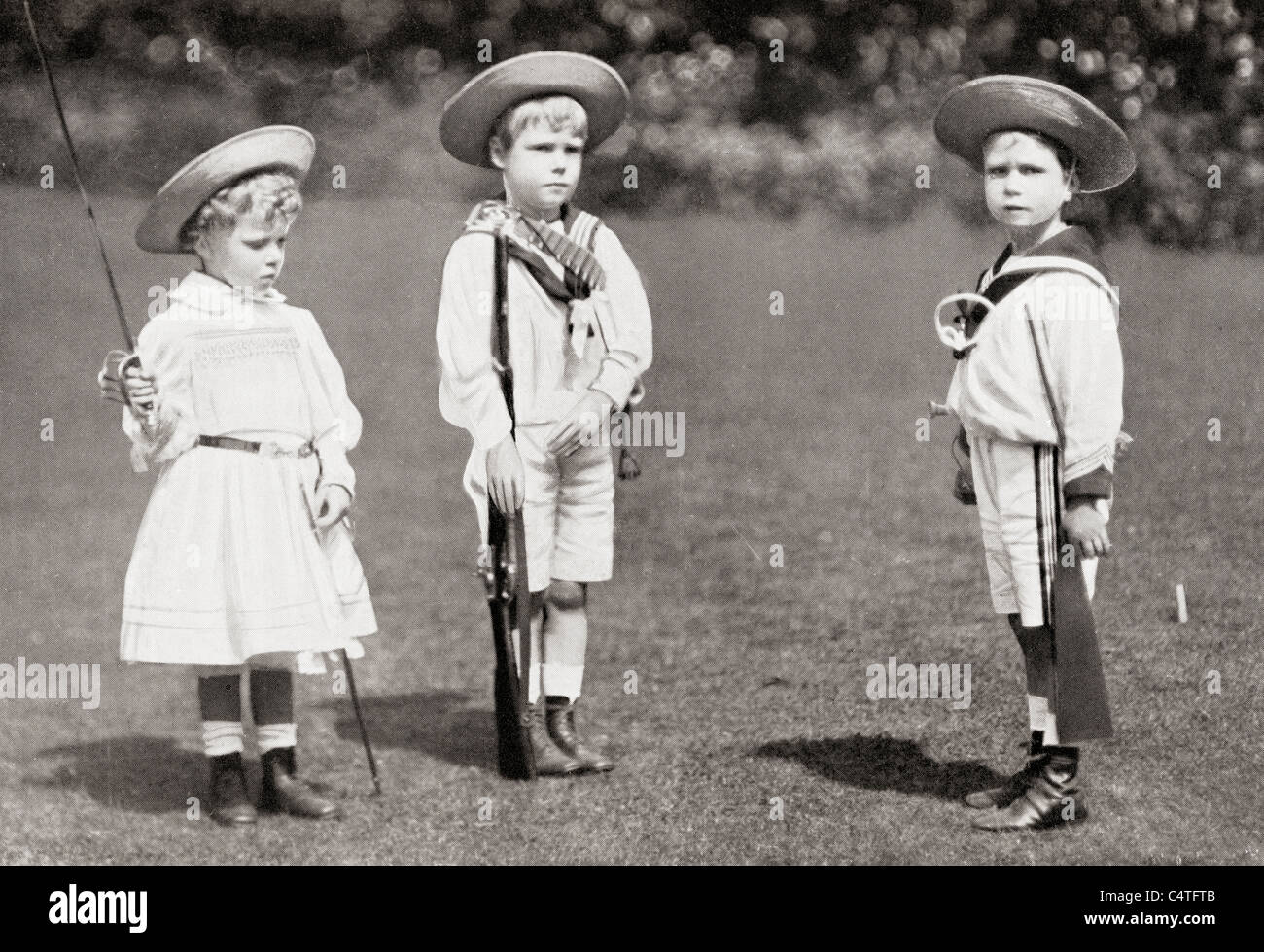 Princess Mary, Prince Edward, later King Edward VIII, and Prince Albert as children. Stock Photo