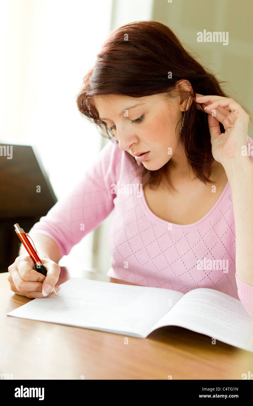 Woman writing letter Stock Photo - Alamy