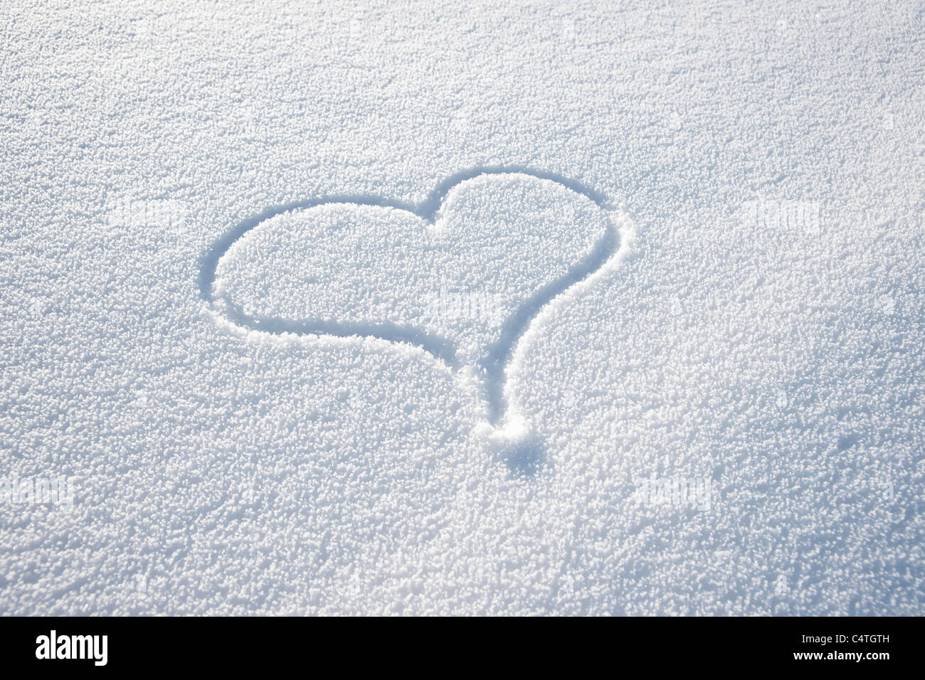 Heart Shape in Snow Stock Photo