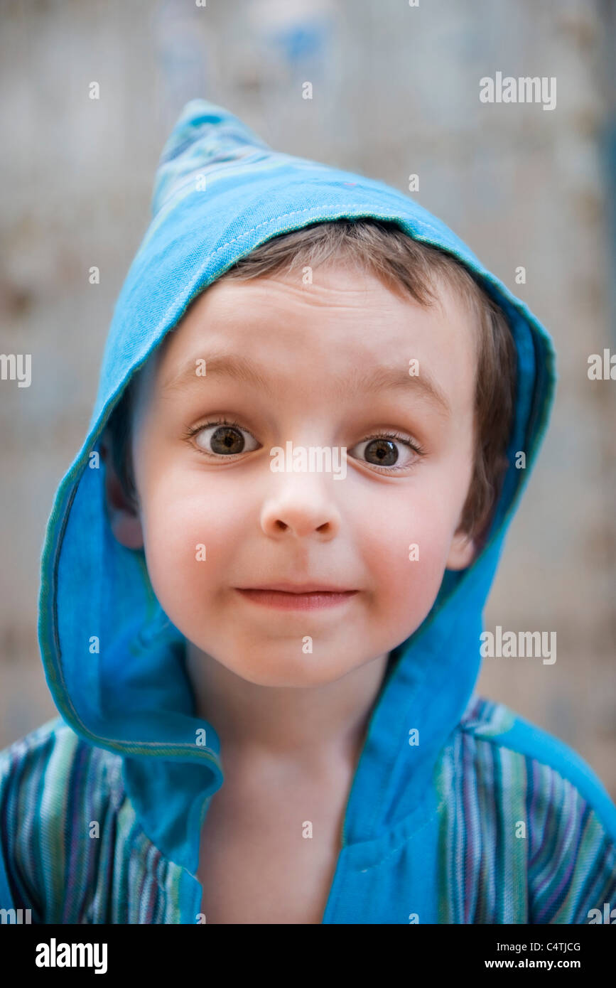 Little Boy Looking At Camera With Surprised Expression Portrait Stock