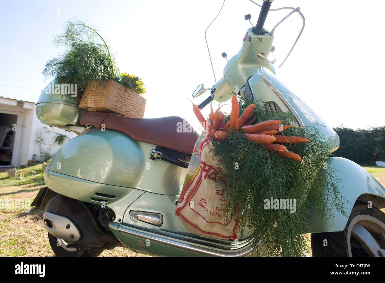Fresh produce on motor scooter Stock Photo
