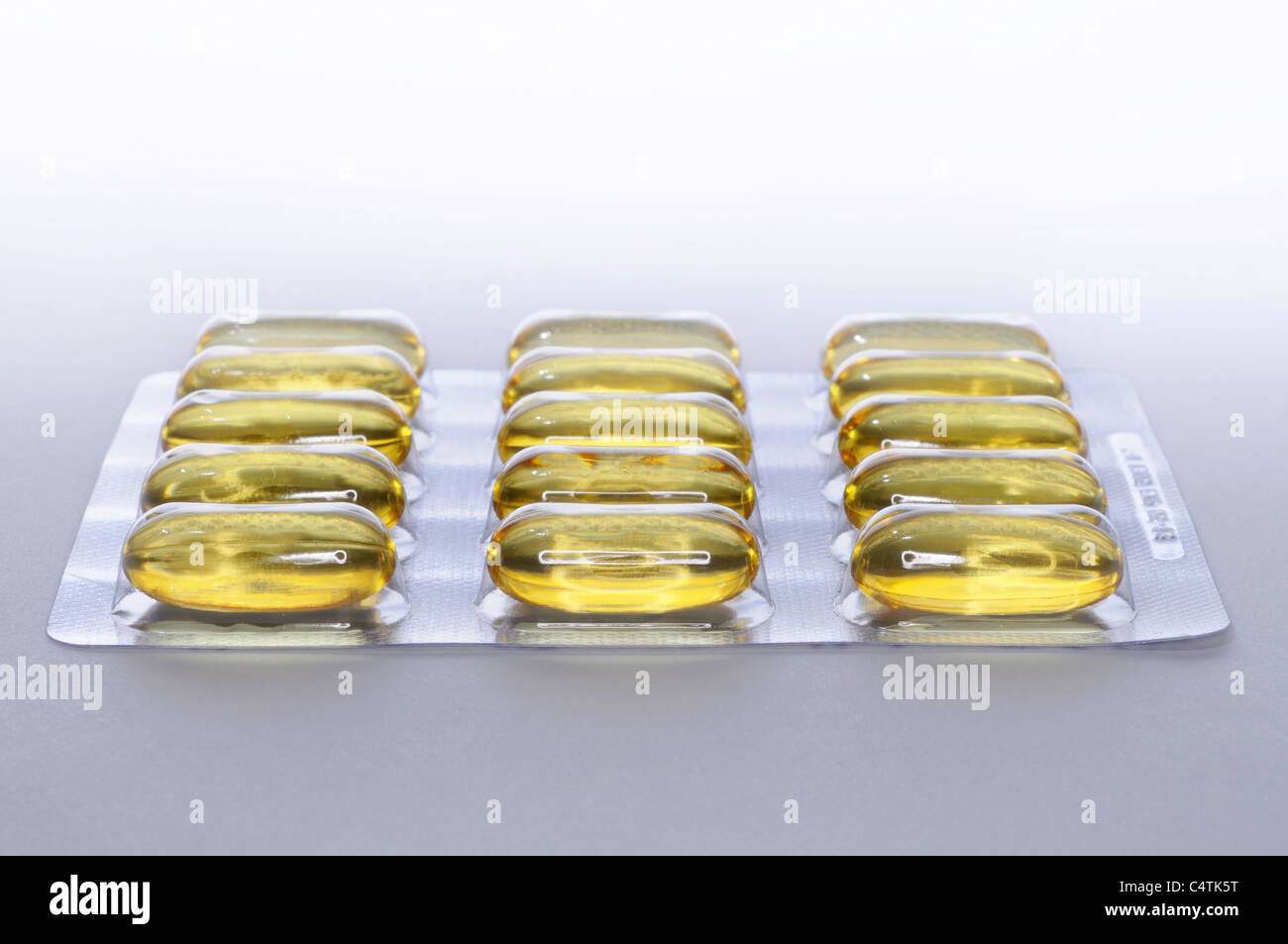 Cod liver oil capules in blister pack Stock Photo