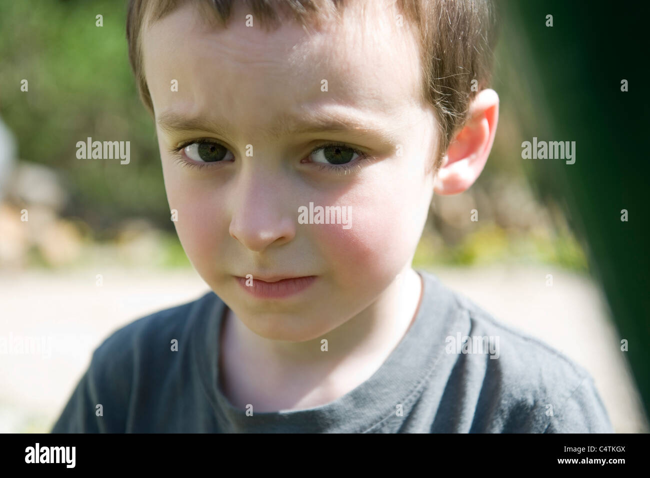 Little boy with worried look on face, portrait Stock Photo Alamy