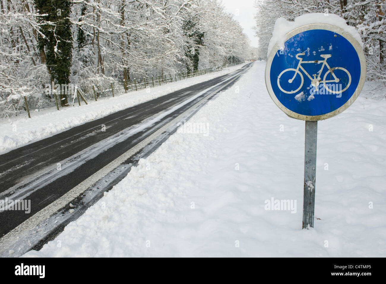 Bicycle path sign in winter Stock Photo