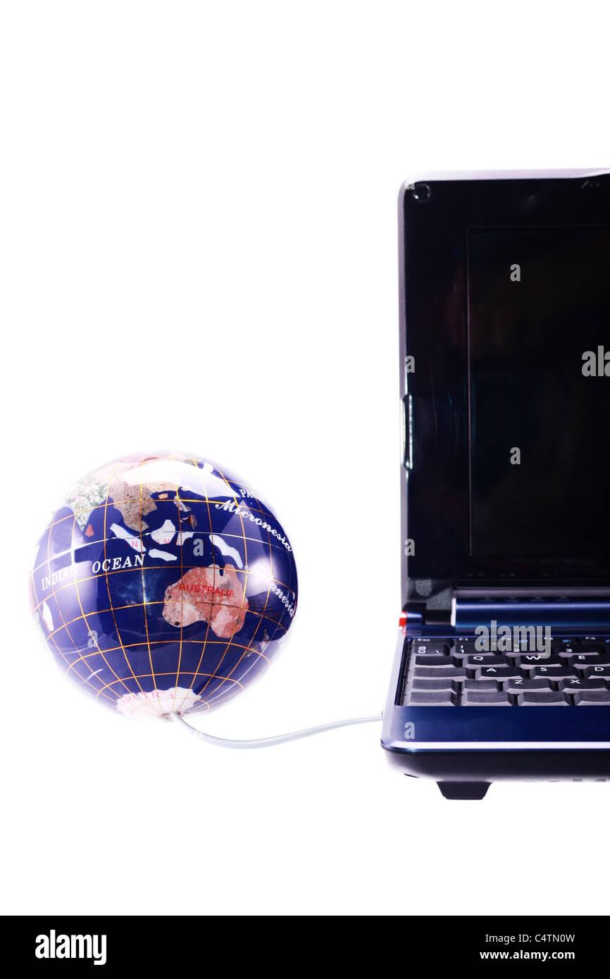 Computer and globe render The World at Your Fingertips concept Stock Photo - Alamy