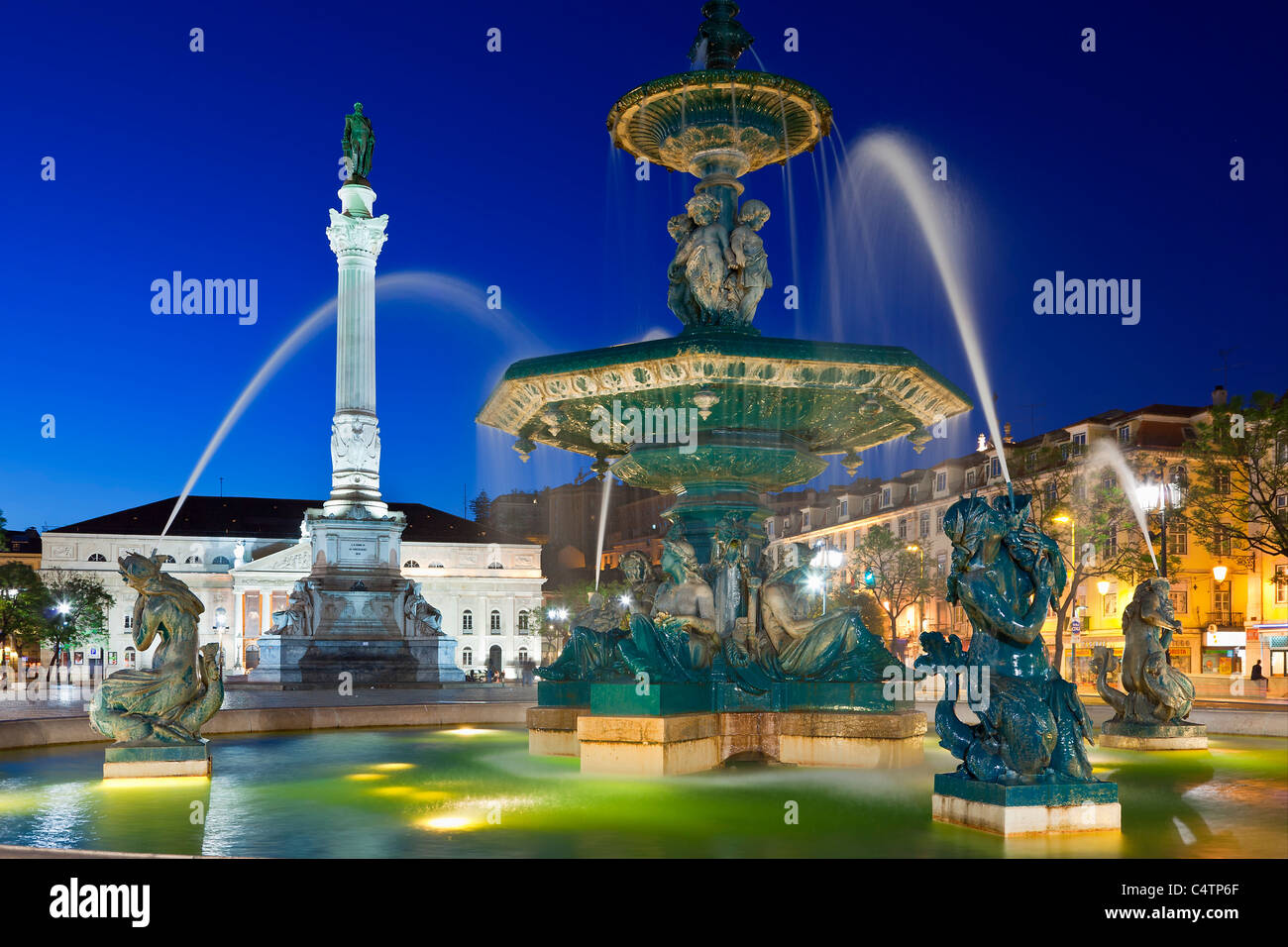 Europe, Portugal, Lisbon, Fountain in Rossio Square at Night Stock Photo