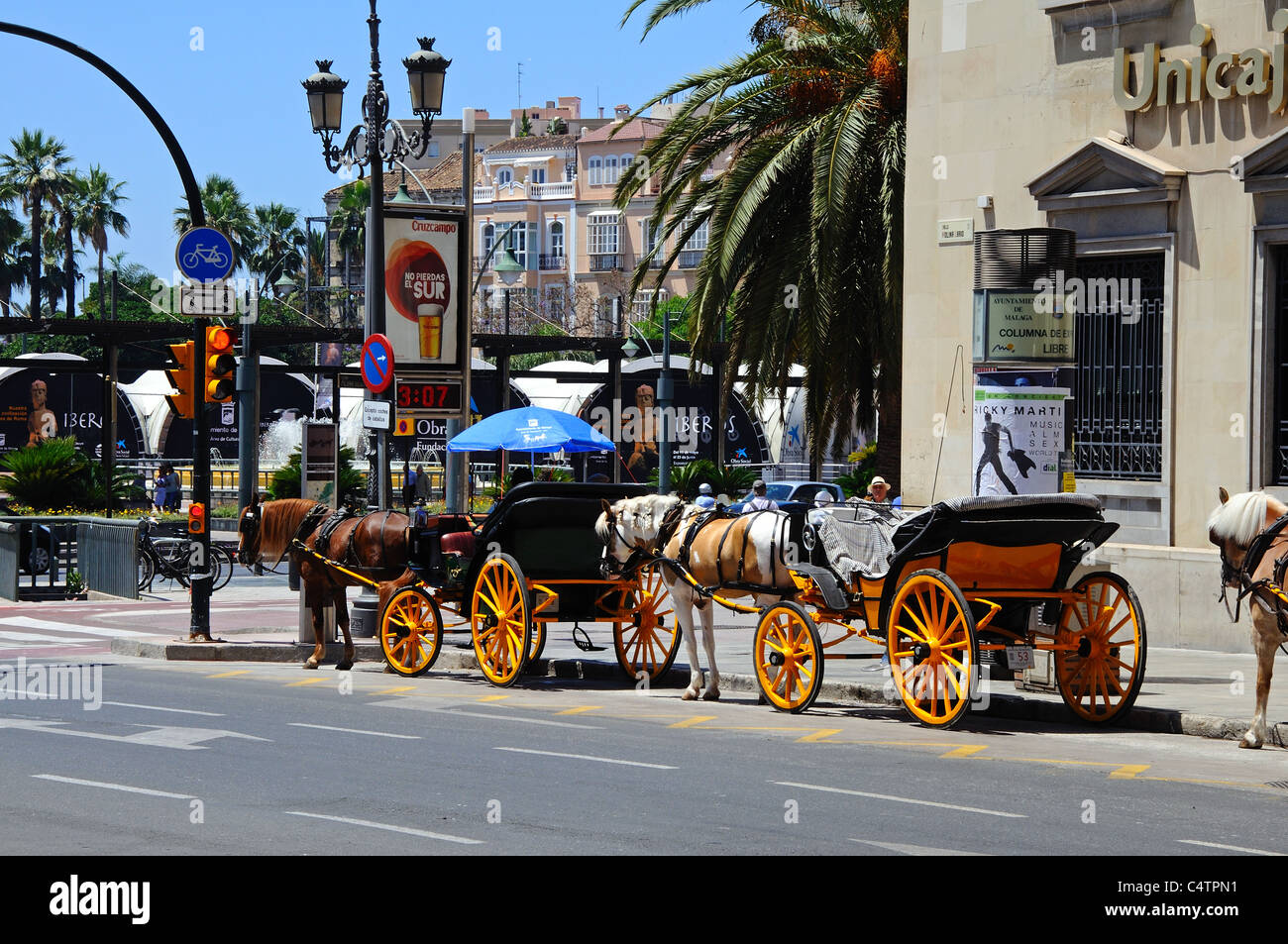 Horse drawn carriages near Cathedral, Molina Lario, Malaga, Costa del Sol, Malaga Province, Andalucia, Spain, Western Europe. Stock Photo