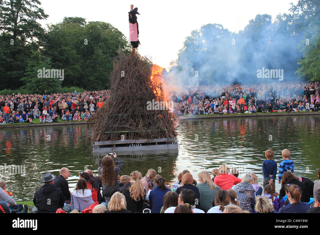 Traditional Danish Midsummer festival (Sankt Hans aften) with bonfires in Frederiksberg park, Denmark Stock Photo