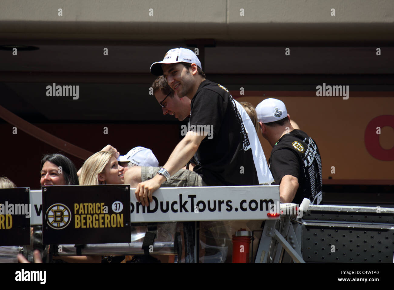 Patrice Bergeron riding by during the Boston Bruins Stanley Cup Parade. Stock Photo