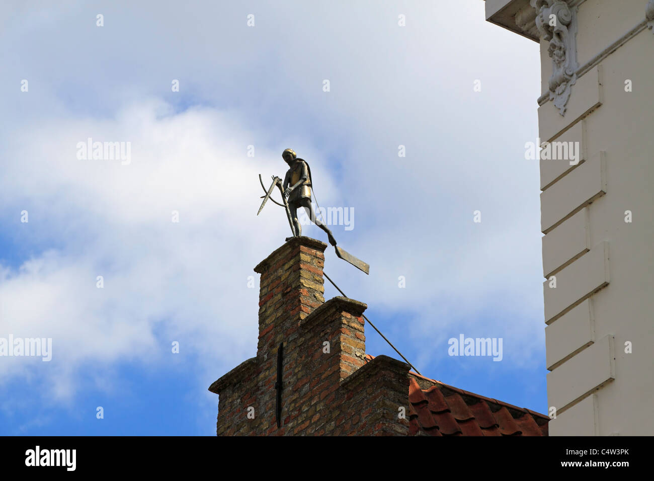 Weathervane on top of a stepped gable on Verversdijk canal, Bruges, Belgium Stock Photo