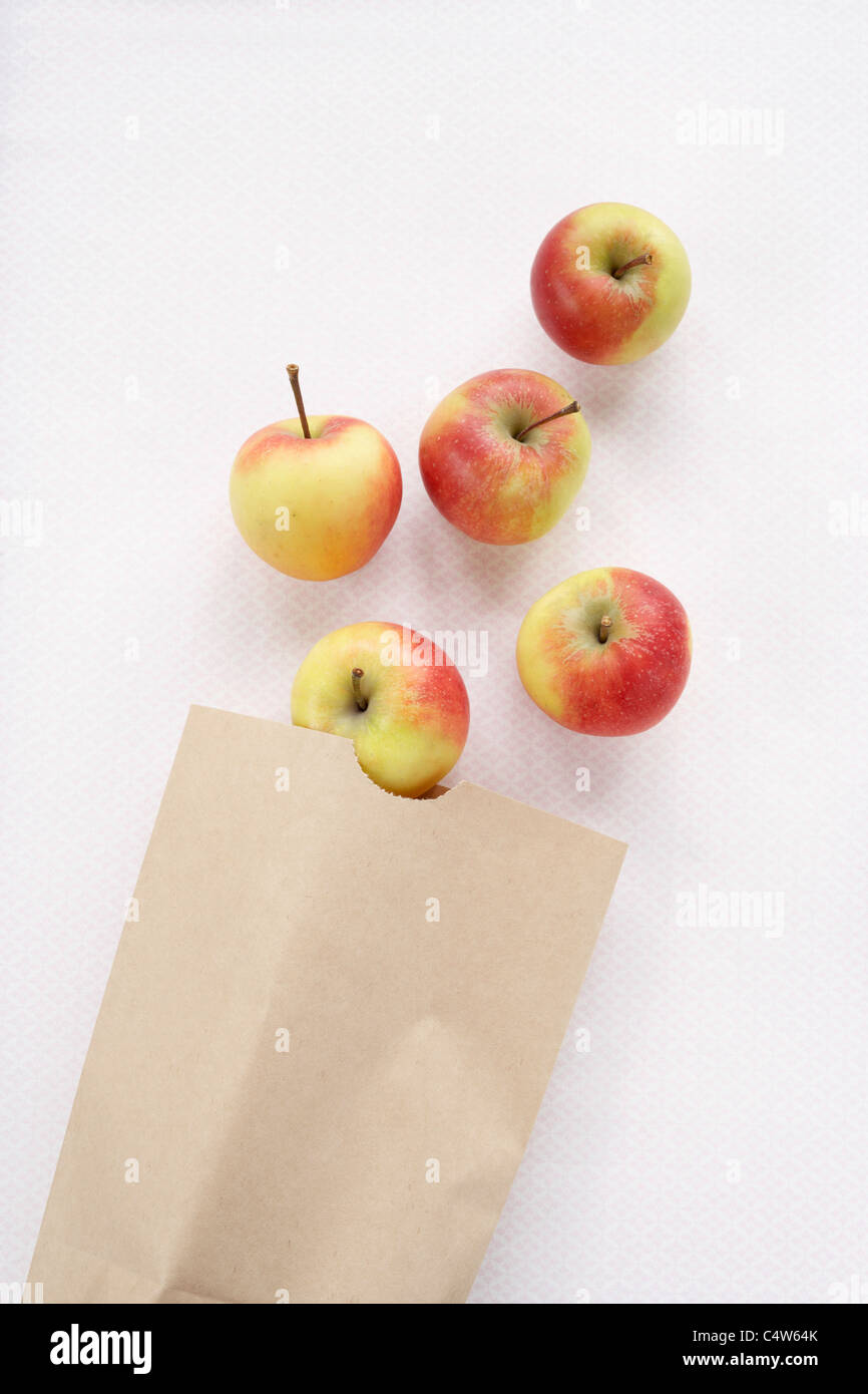 Apples in Brown Paper Bag Stock Photo - Alamy