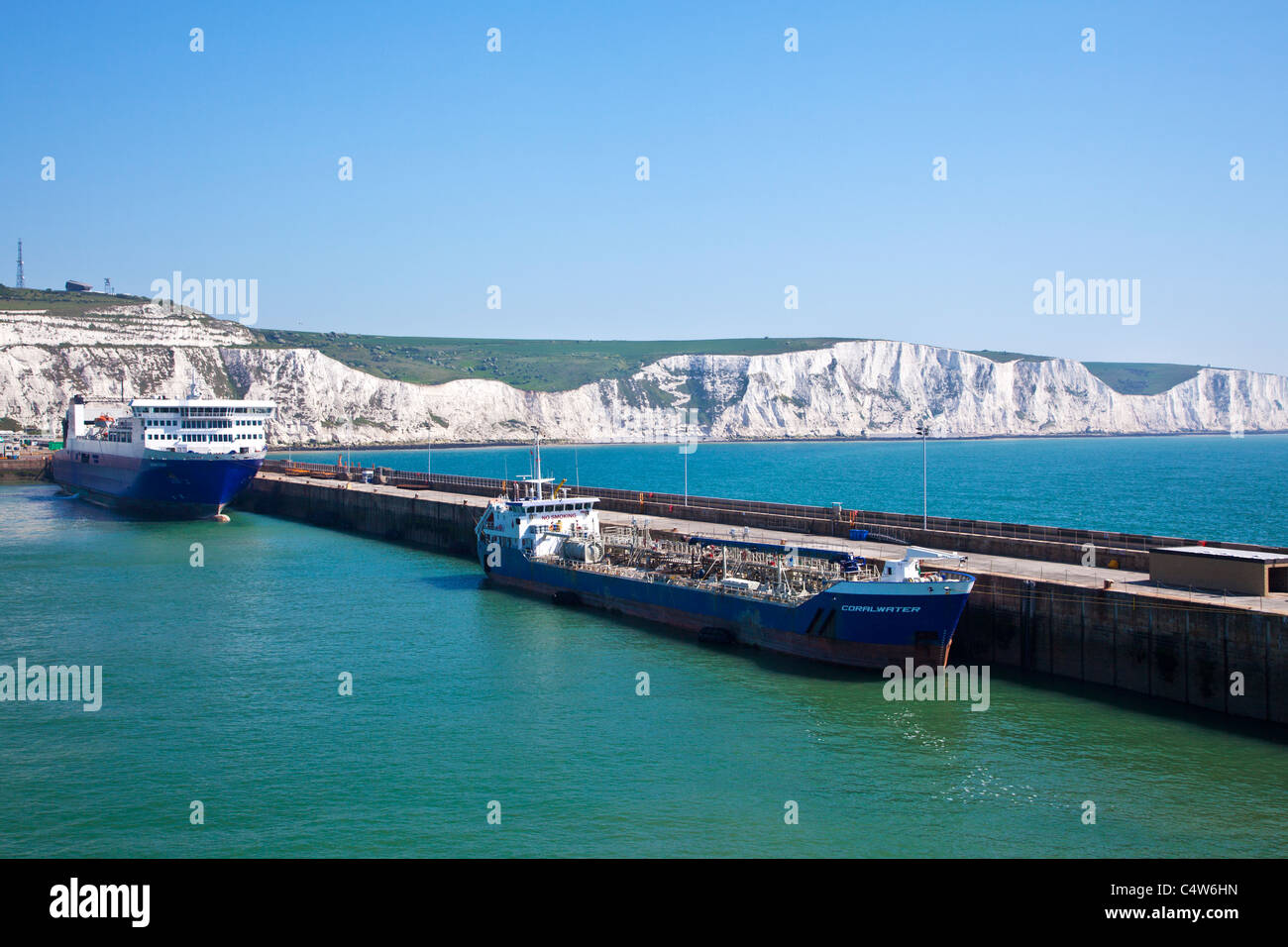 White Cliffs of Dover and a cargo ship and ferry moored along the