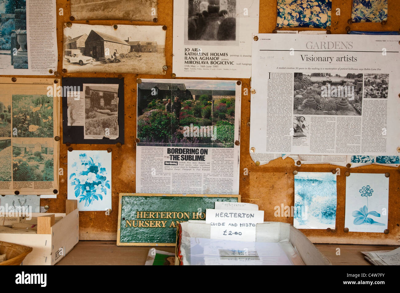 A faded collection of reviews / articles about Herterton House garden - on display in the plant shop.  Northumberland, UK. Stock Photo