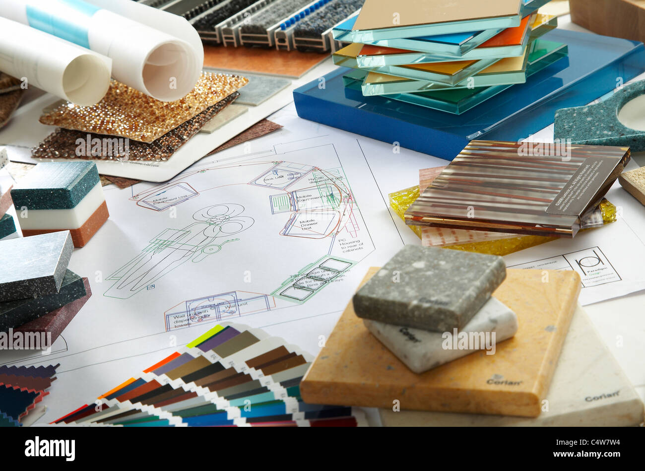 A desk full of swatches, samples and planning designs Stock Photo - Alamy