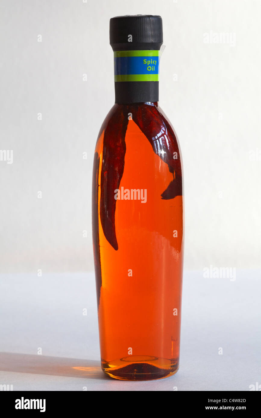 Bottle of Spicy Oil isolated on white background Stock Photo