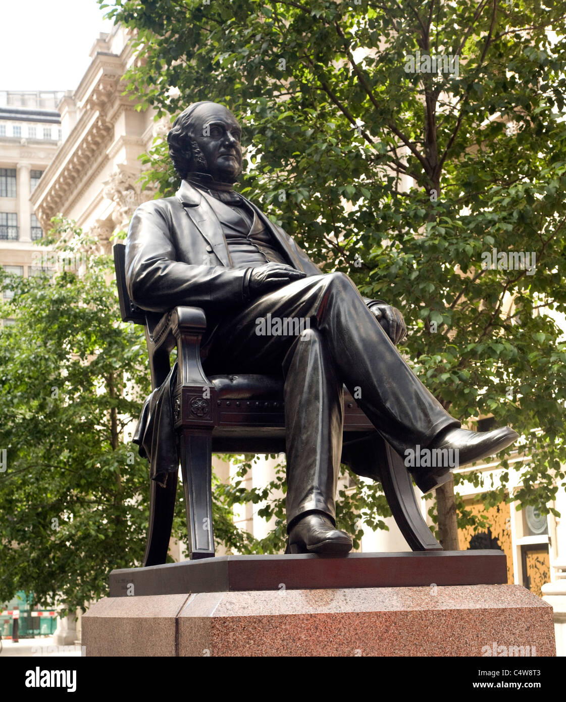 Statue of Sir George Peabody at the rear of the Royal Exchange, City of London, London Stock Photo