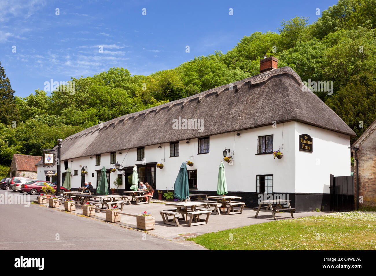 The Hambro Arms village pub with thatched roof in the pretty English