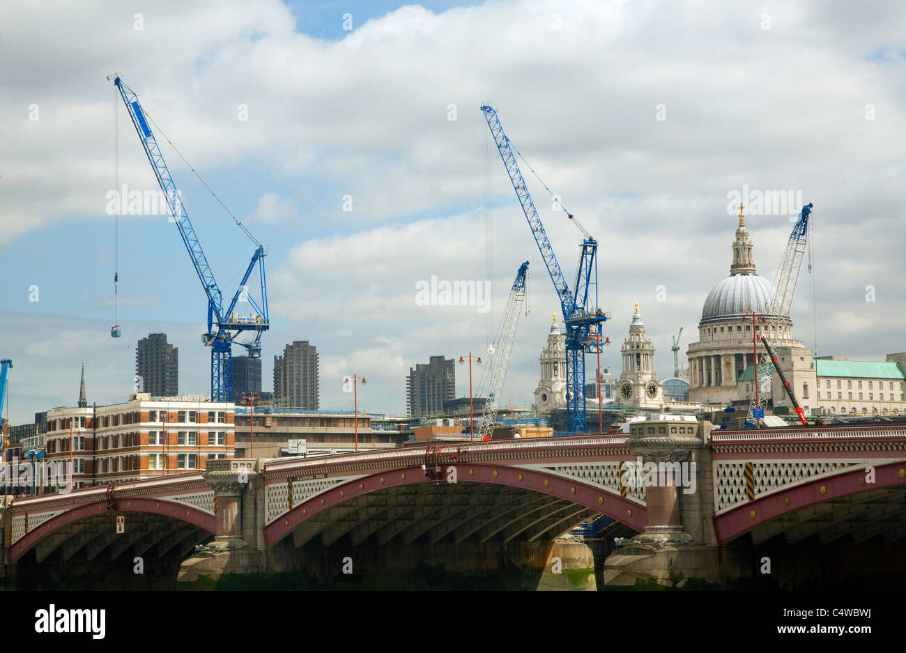 Large cranes near St Paul's and Blackfriars Bridge London Stock Photo