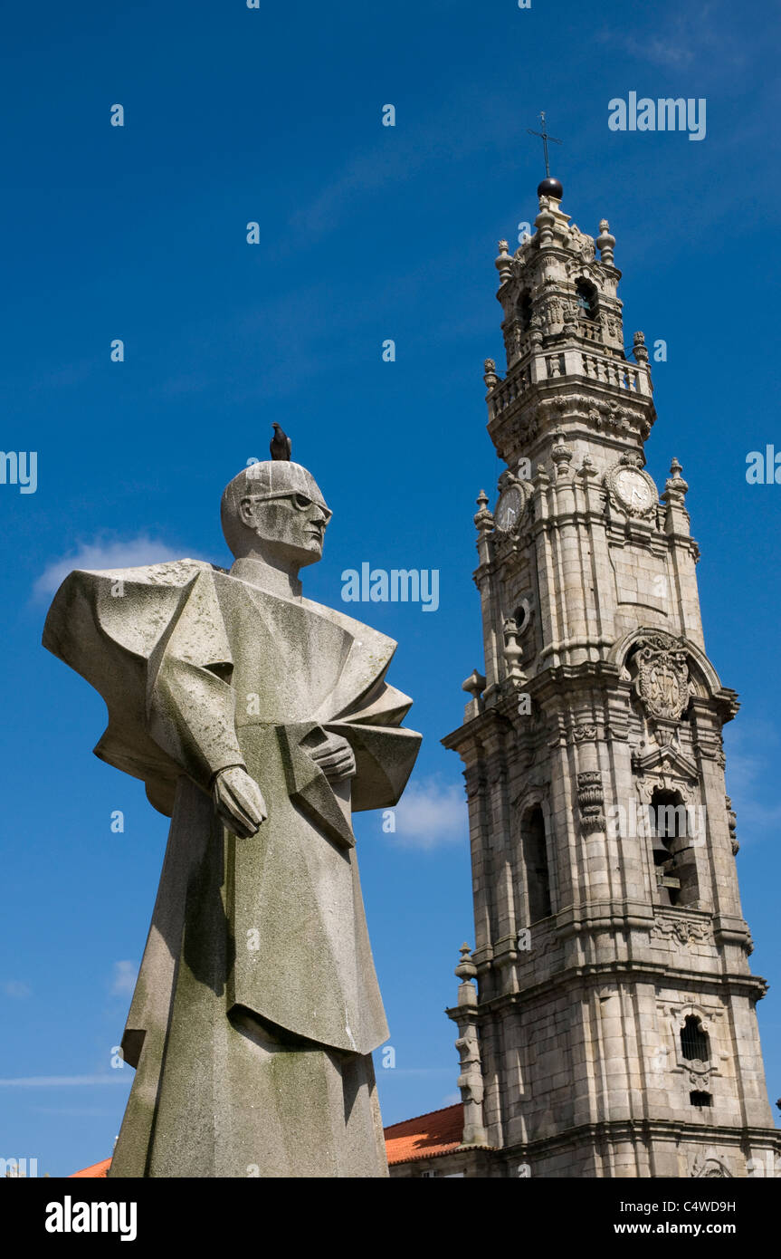 The memorial to Antonio Ferreira Gomes (1906 - 1989), the Bishop of Porto with pigeon on head. and Clerigos church tower Stock Photo