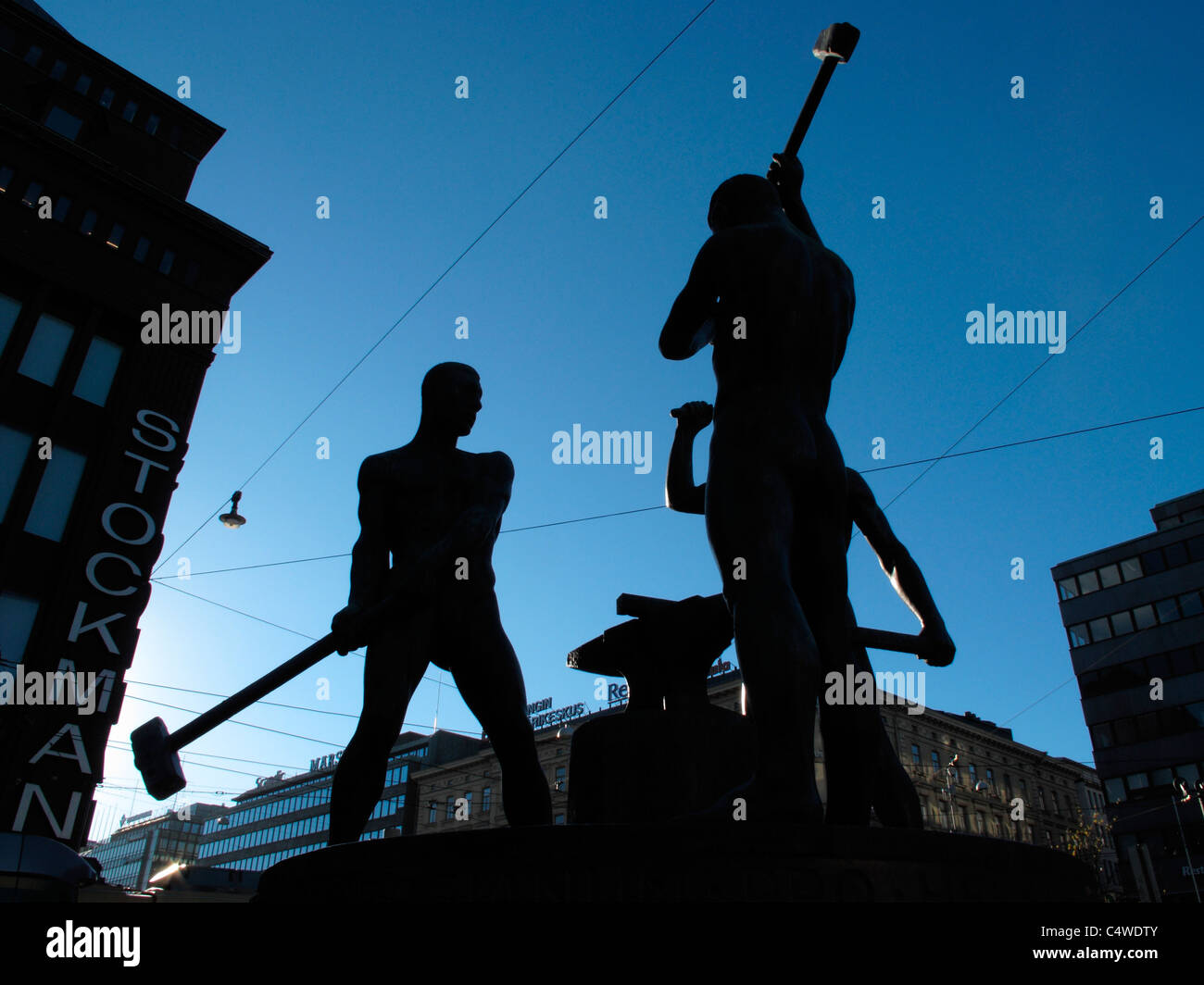 Finland Helsinki sculpture in front of Stockmann Stock Photo - Alamy