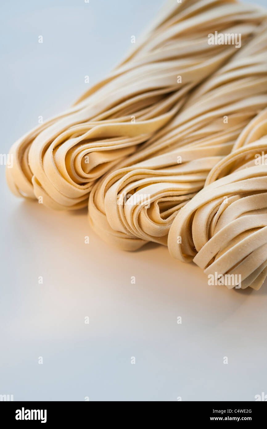 Studio shot of fresh linguini pasta Stock Photo
