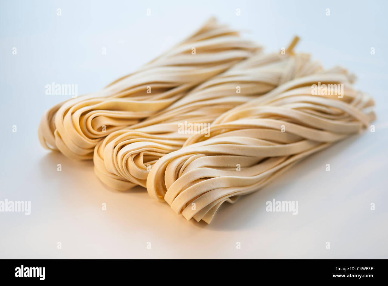 Studio shot of fresh linguini pasta Stock Photo