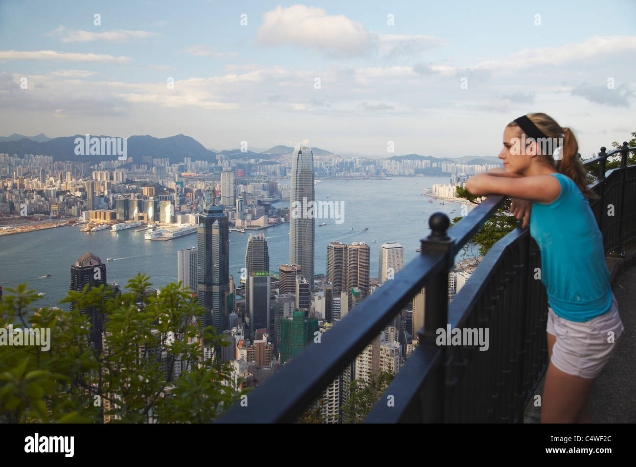 Woman enjoying view from Victoria Peak, Hong Kong, China Stock Photo
