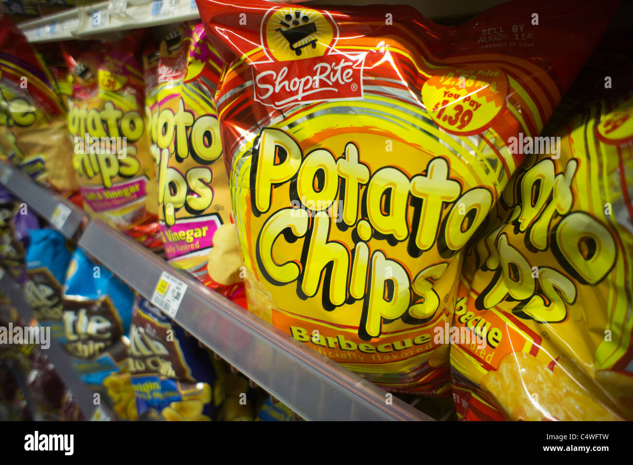 A display of house brand potato chips are seen in a supermarket in New