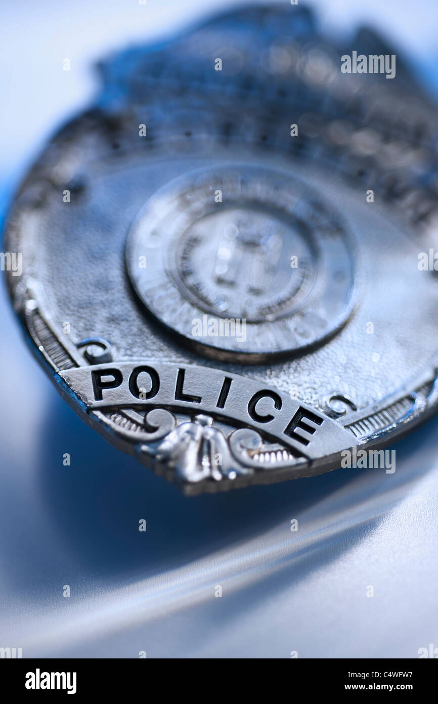 Close-up of police badge, studio shot Stock Photo