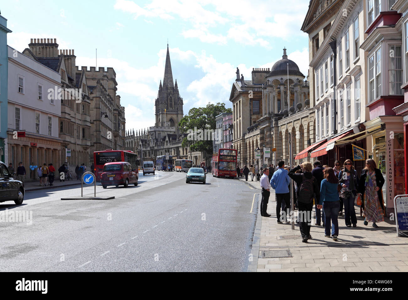 Shoppers, Tourists and Students on the High Street in Oxford, England. Stock Photo