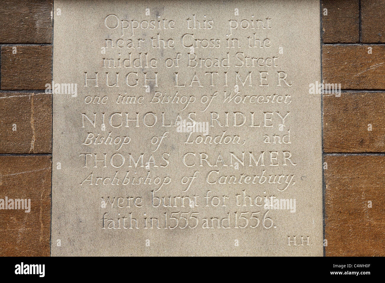 A plaque records the spot when the Oxford Martyrs were put to death in 1555 and 1556. Stock Photo