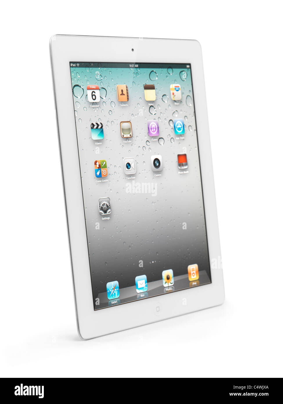 White Apple iPad 2 tablet computer with desktop icons on its display. Isolated with clipping path on white background. Stock Photo