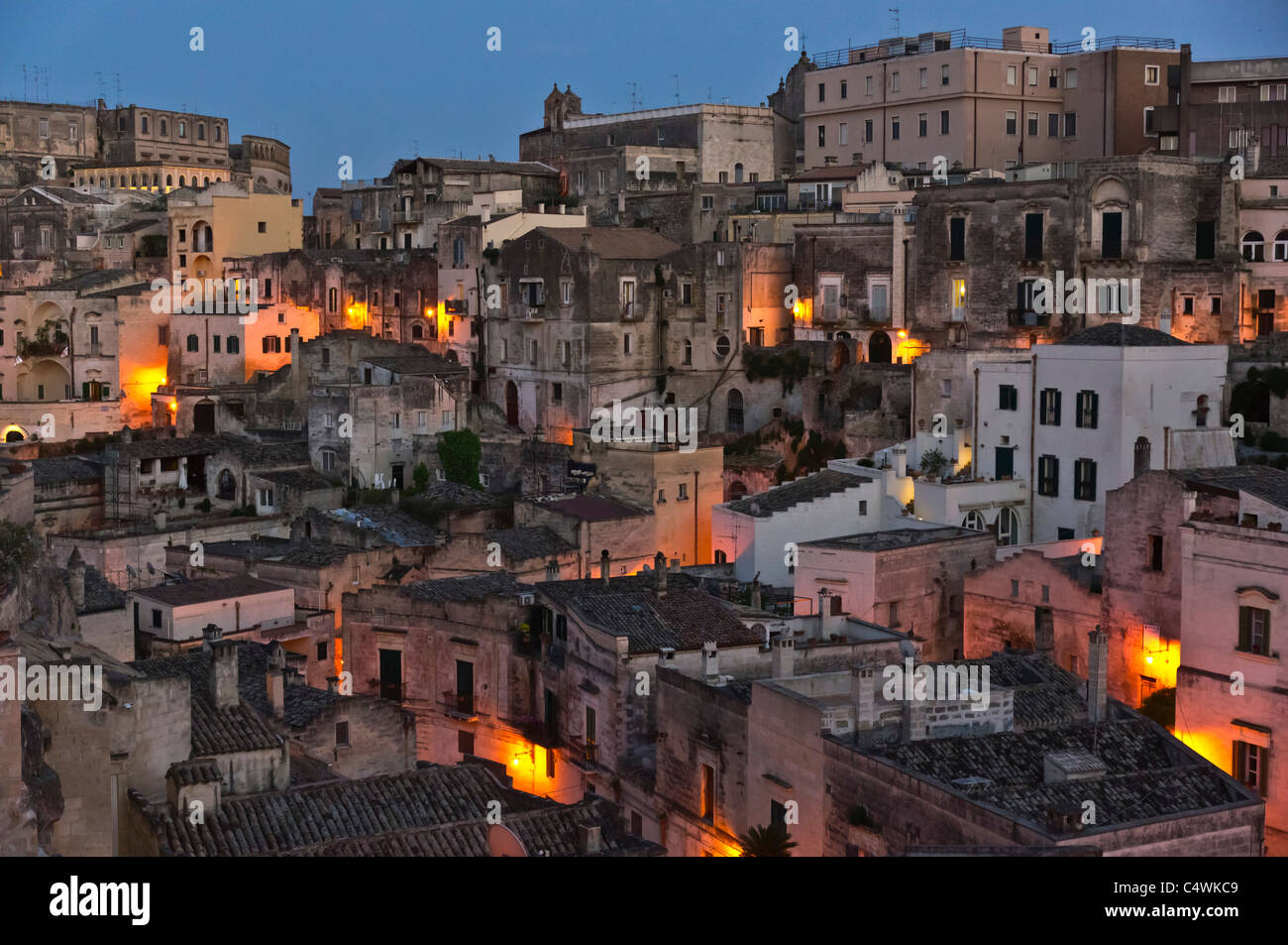 Italy - Matera, the Sasso Barisano at dusk. Stock Photo