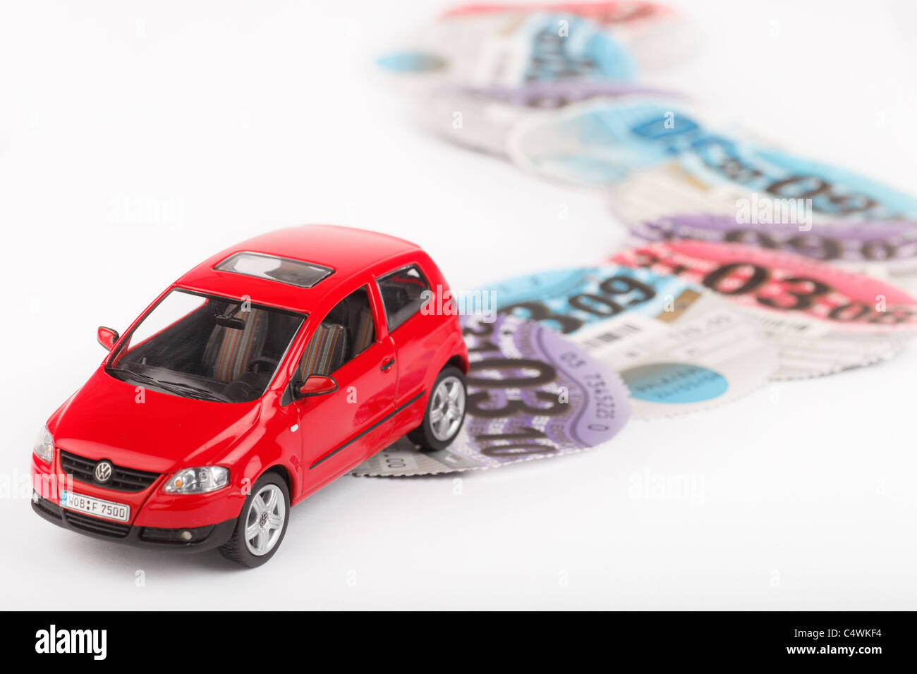 toy car and road tax disks UK Stock Photo