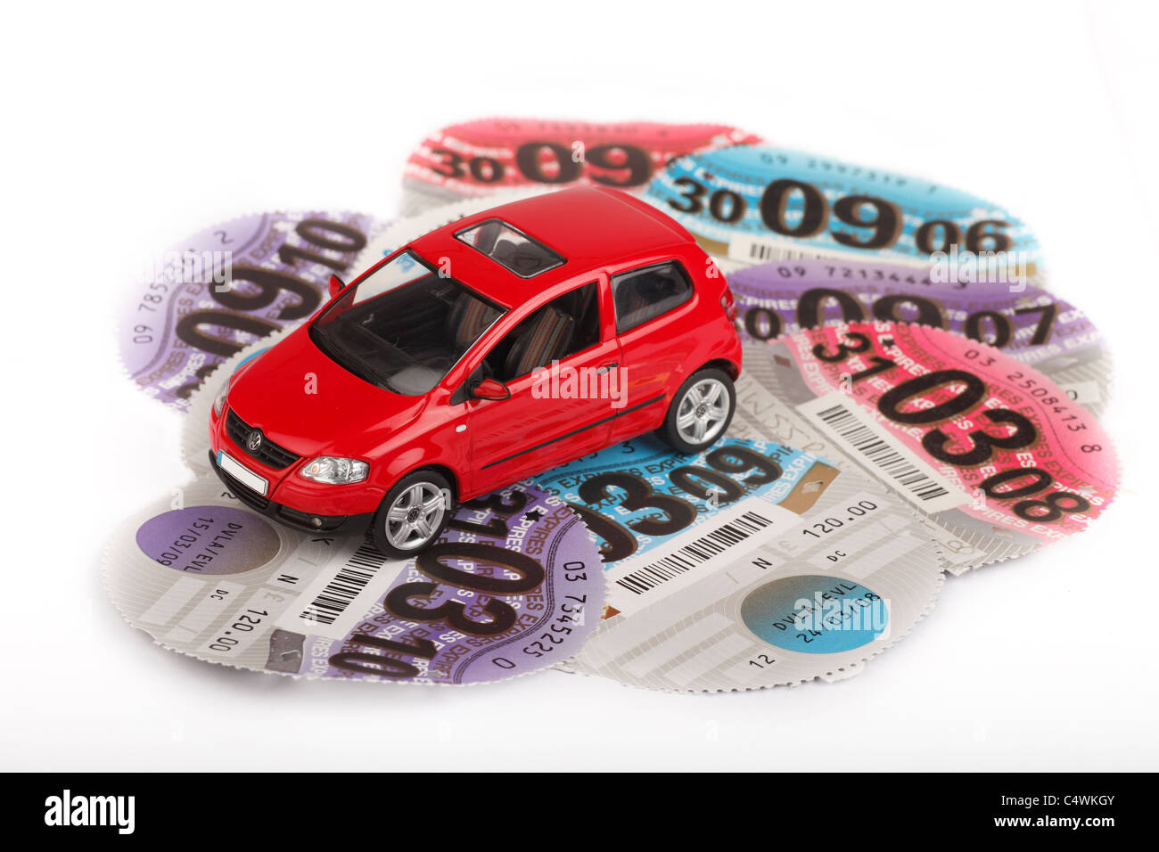 toy car and road tax disks UK Stock Photo