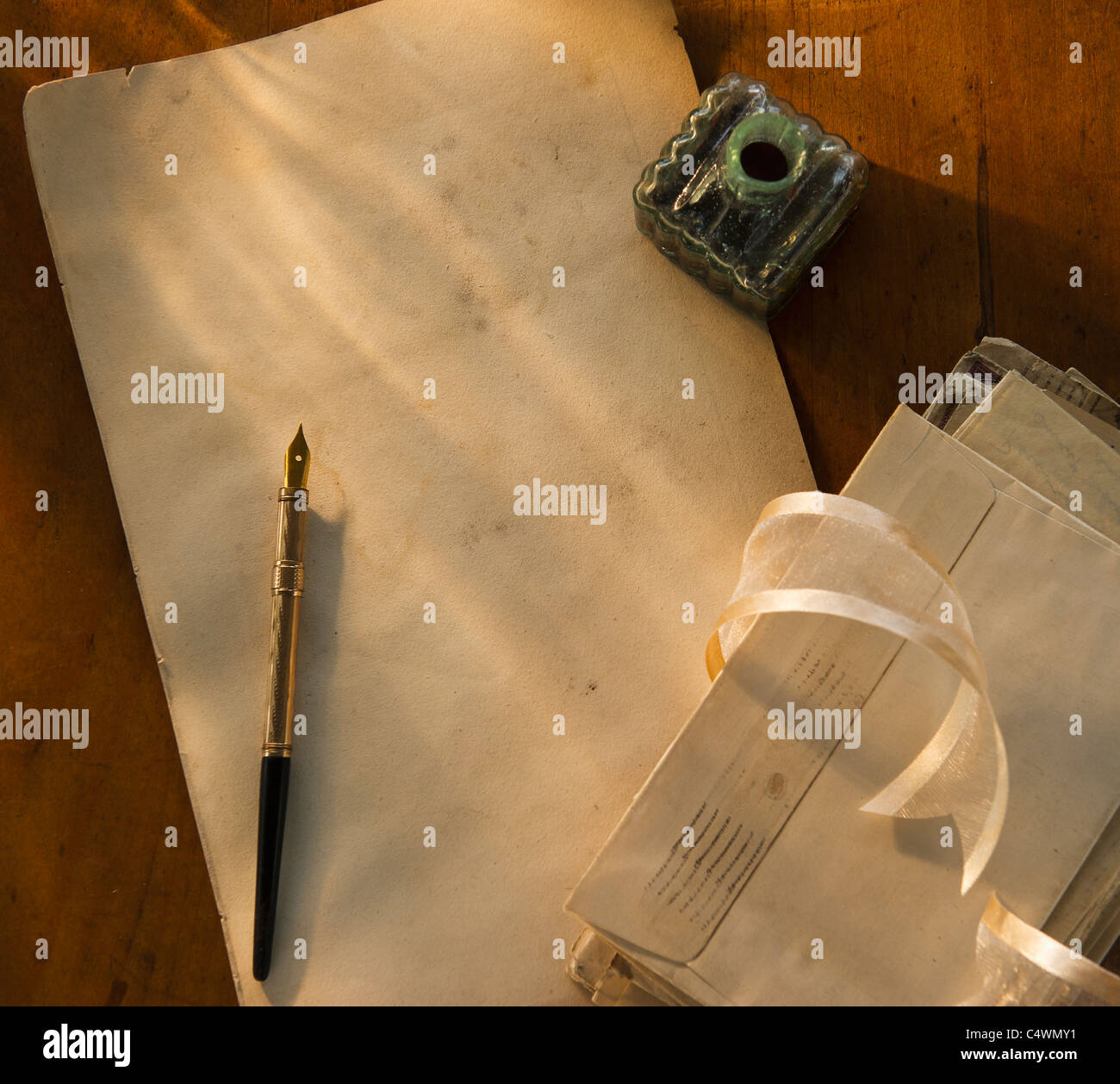 Studio shot of pen, ink well and envelops Stock Photo - Alamy