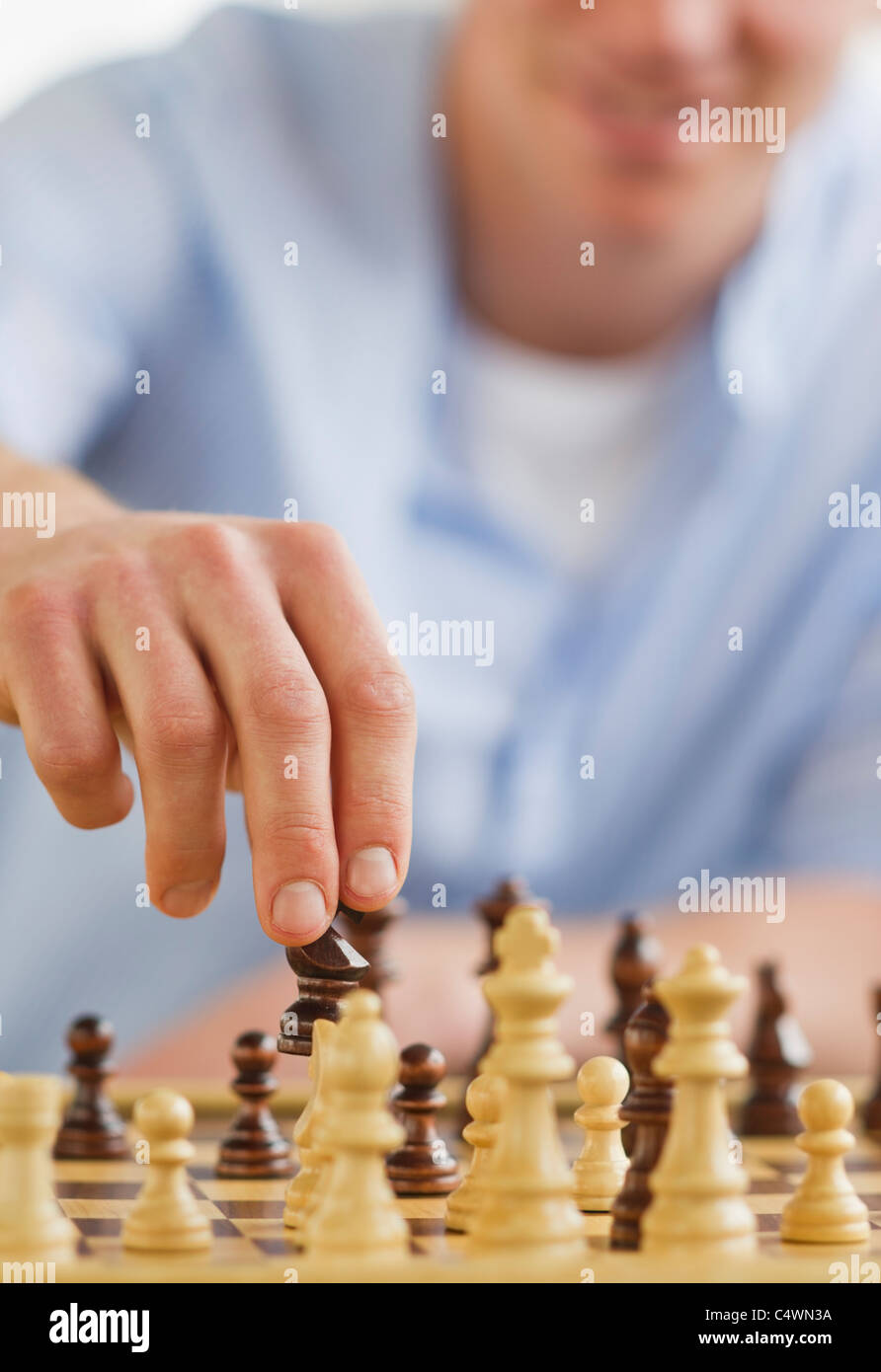 A chess player making his next chess move, Stock image