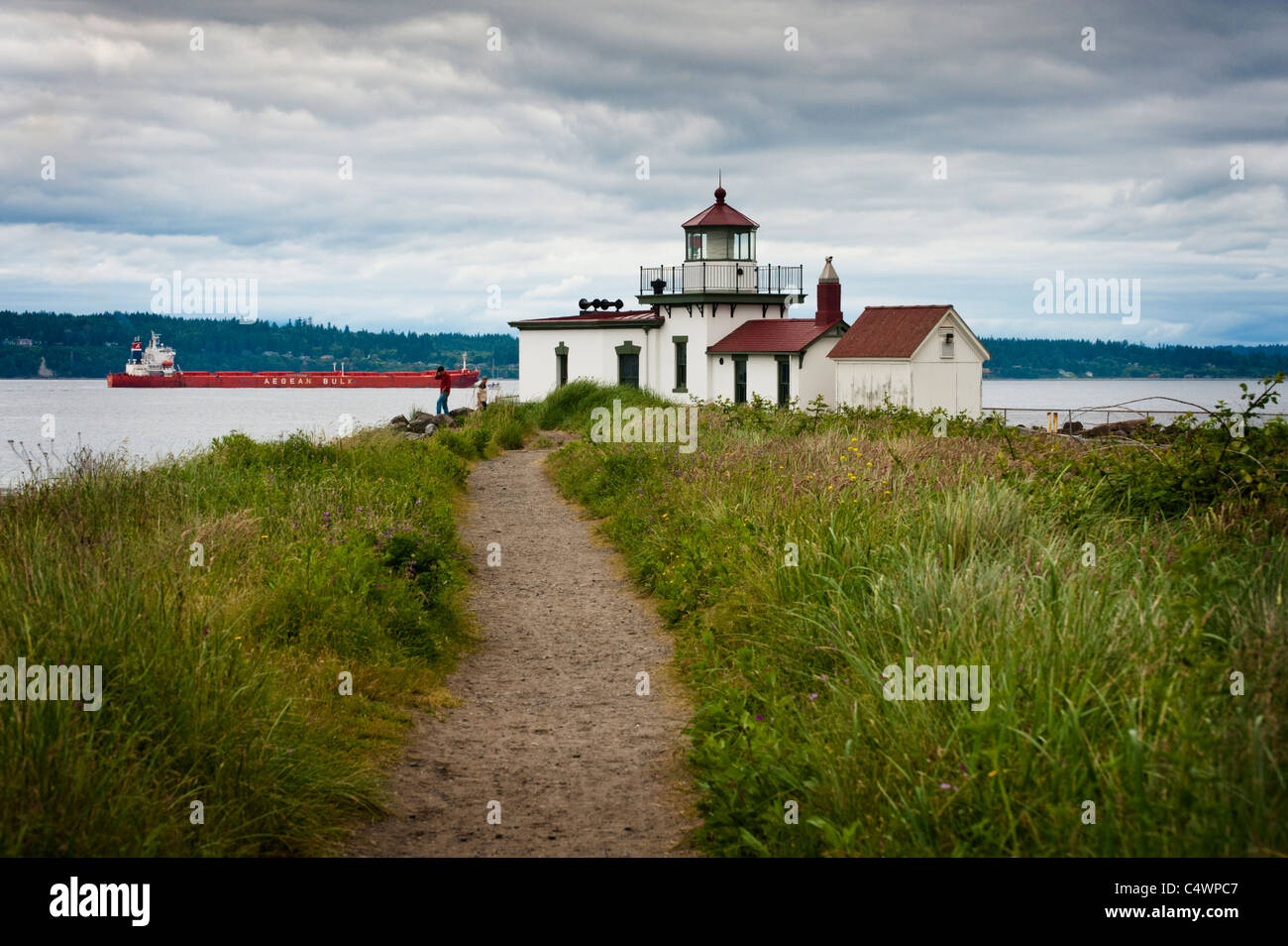 The West Point Light, also known as the Discovery Park Lighthouse, is a 23-foot-high lighthouse in Seattle, Washington, USA. Stock Photo